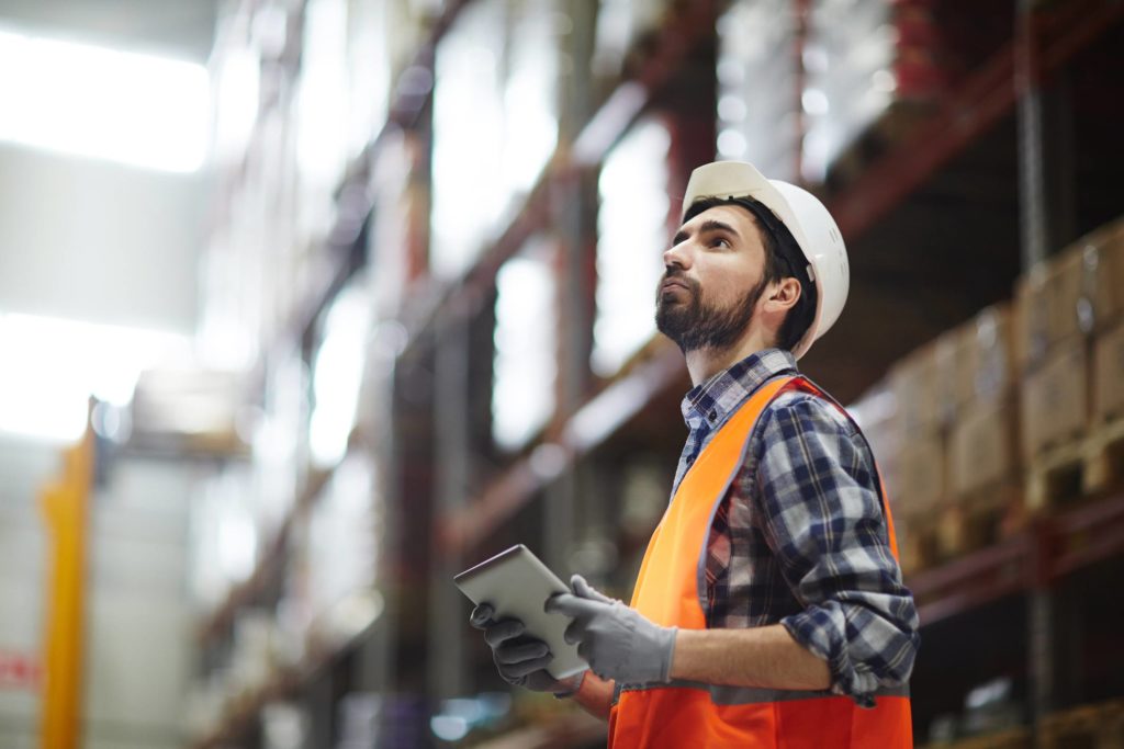 checking inventory for packing trading materials in wharehouse